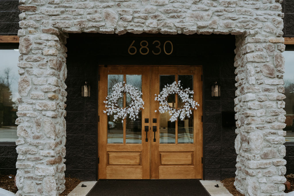 front doors of chosen feather salon