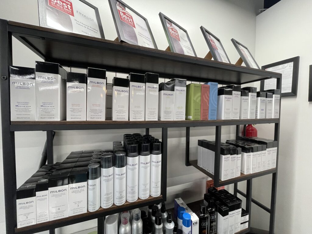 milbon products on the shelf at chosen feather salon